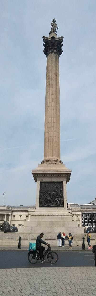 A tall pillar with people walking around with Nelson's Column in the background
AI-generated content may be incorrect. A tall pillar with people walking around with Nelson's Column in the background
AI-generated content may be incorrect.