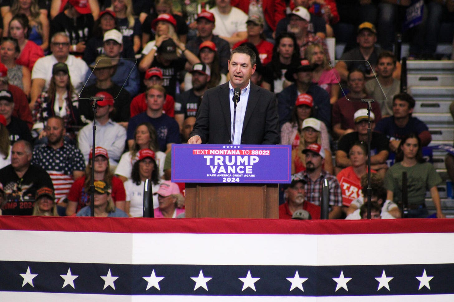 Montana Attorney General Austin Knudsen speaks at a rally featuring former President Donald Trump in Bozeman on Aug. 9, 2024. (Photo by Blair Miller, Daily Montanan) Montana Attorney General Austin Knudsen speaks at a rally featuring former President Donald Trump in Bozeman on Aug. 9, 2024. (Photo by Blair Miller, Daily Montanan)