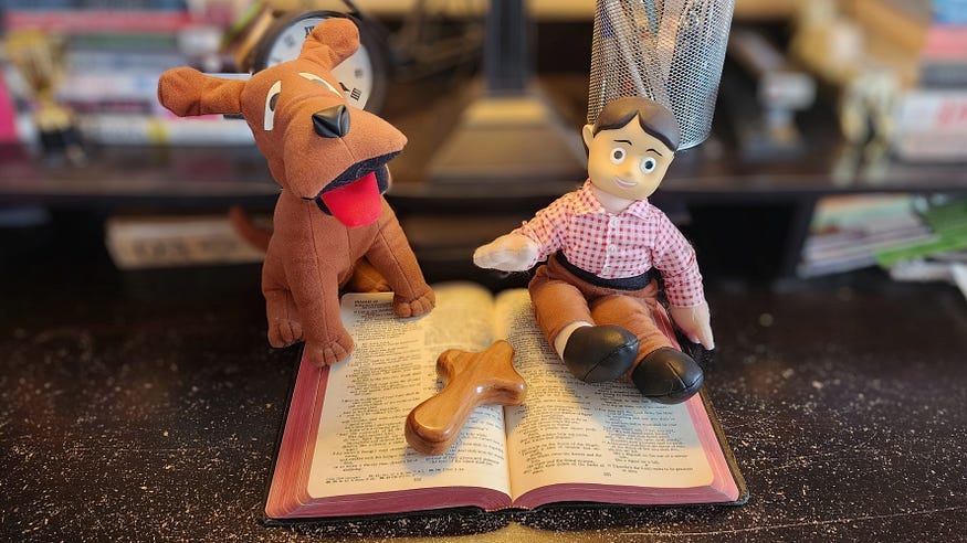 Authors Cherished Lutheran mementos: My 3rd-grade Bible, Davey & Goliath, and my pocket cross.