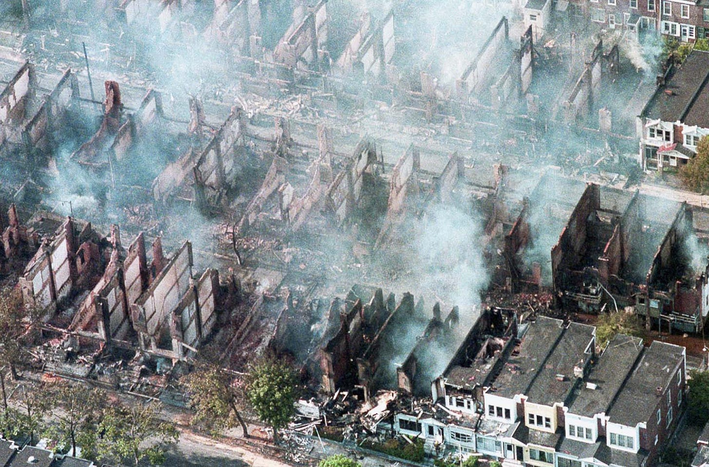 The tense standoff with the radical MOVE group tragically escalated into a full-scale assault, culminating in a bomb being dropped on a residential Philadelphia neighborhood.