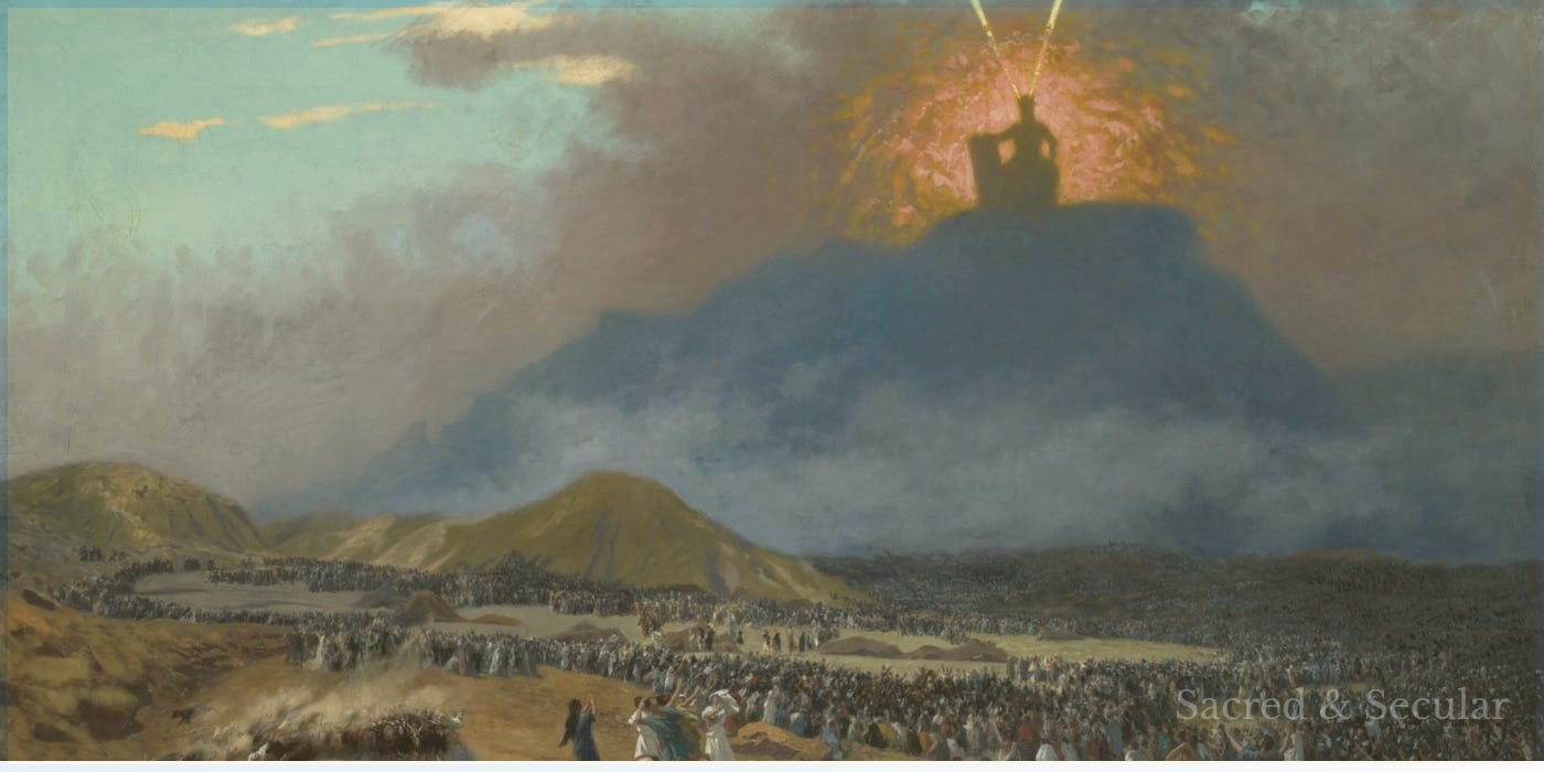 Moses stands high on the rocky slopes of Mount Sinai above the assembled Israelites, surrounded by dramatic light and shadow.