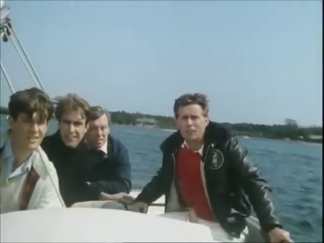 The Kennedys and Dave sailing; JFK's sailboat (note the number 109 written on the sail).