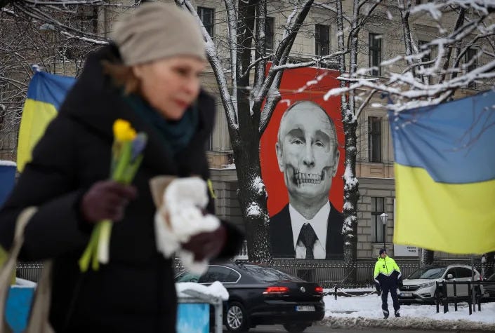 A mural depicting Russia's President Vladimir Putin decorates a building adjacent to the Russian Embassy in Riga, Latvia, in February. A mural depicting Russia's President Vladimir Putin decorates a building adjacent to the Russian Embassy in Riga, Latvia, in February.