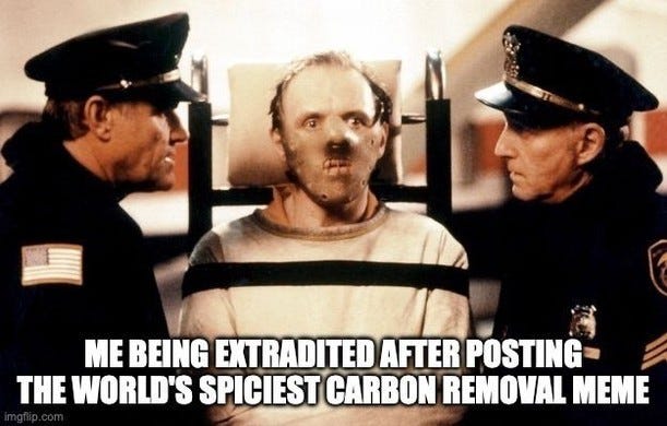 Hannibal Lecter masked and strapped to a hand truck between two police officers, captioned "Me being extradited after posting the world's spiciest carbon removal meme".