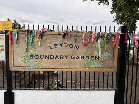 Images of the Leyton Boundary garden sign and pavilion decked in bunting, and the visiting crowds at the community garden.
