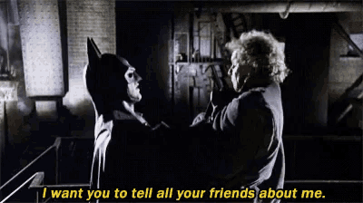a man talking to a batman with the words " i want you to tell all your friends about me " below him