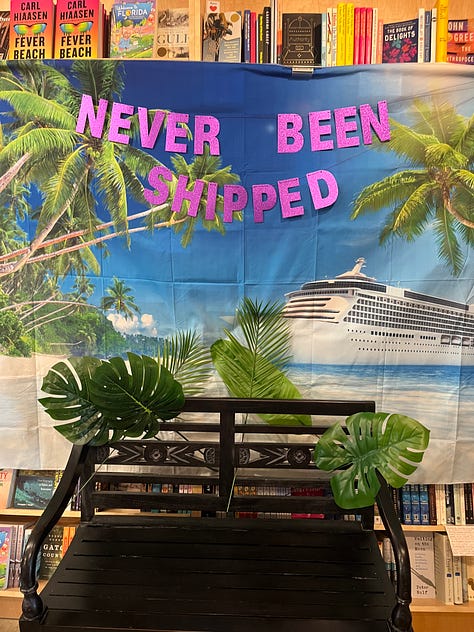 left: the bench in front of the cruise backdrop with "Never Been Shipped" strung above, center: a teal mocktail with a little umbrella in it and a sign that says "ElectricOh!", right: the outside of Tombolo at night