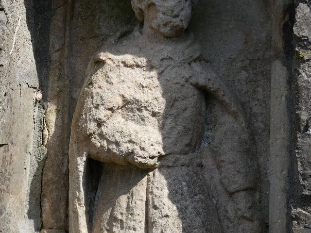 St. Colmcille's Well, Calliaghstown, Co. Meath, View of the carved figure's torso St. Colmcille's Well, Calliaghstown, Co. Meath, View of the carved figure's torso