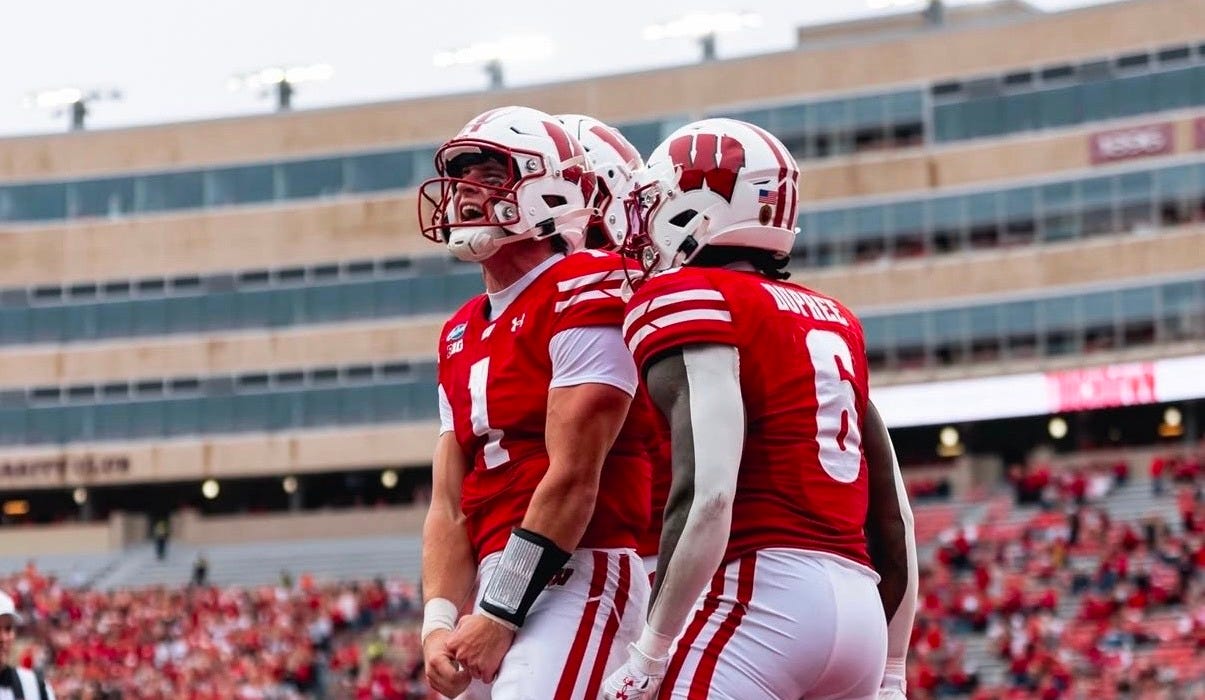 Wisconsin quarterback Colton Joseph celebrates in the end zone after scoring a touchdown against Eastern Michigan. Wisconsin quarterback Colton Joseph celebrates in the end zone after scoring a touchdown against Eastern Michigan.