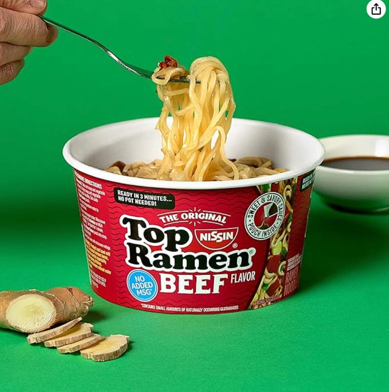 A hand holding a fork over a bowl of noodles

AI-generated content may be incorrect.