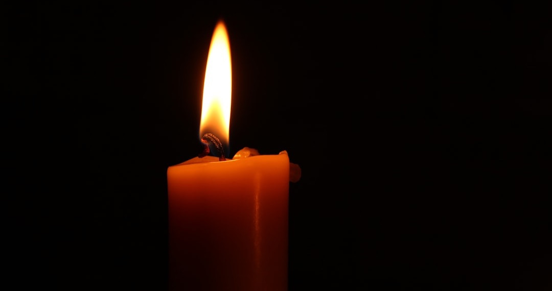 close-up of lighted candle close-up of lighted candle