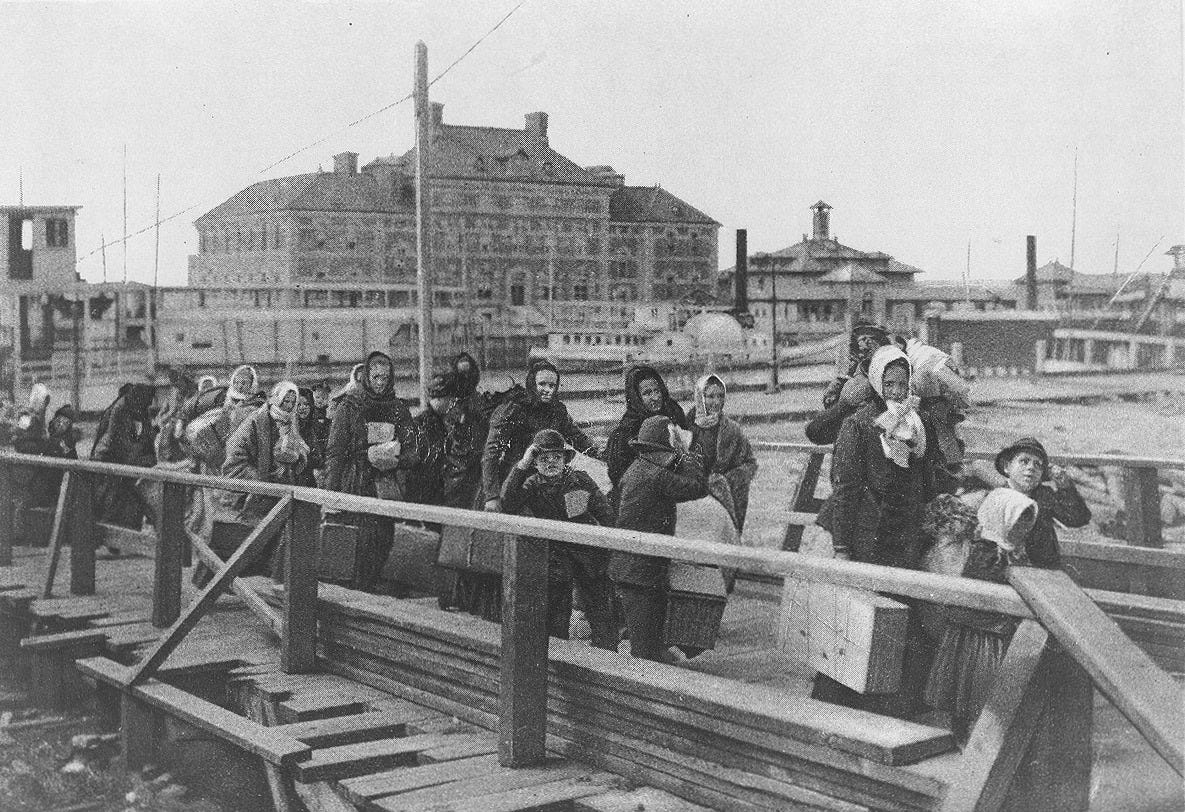 Immigrants arriving at Ellis Island around 1902