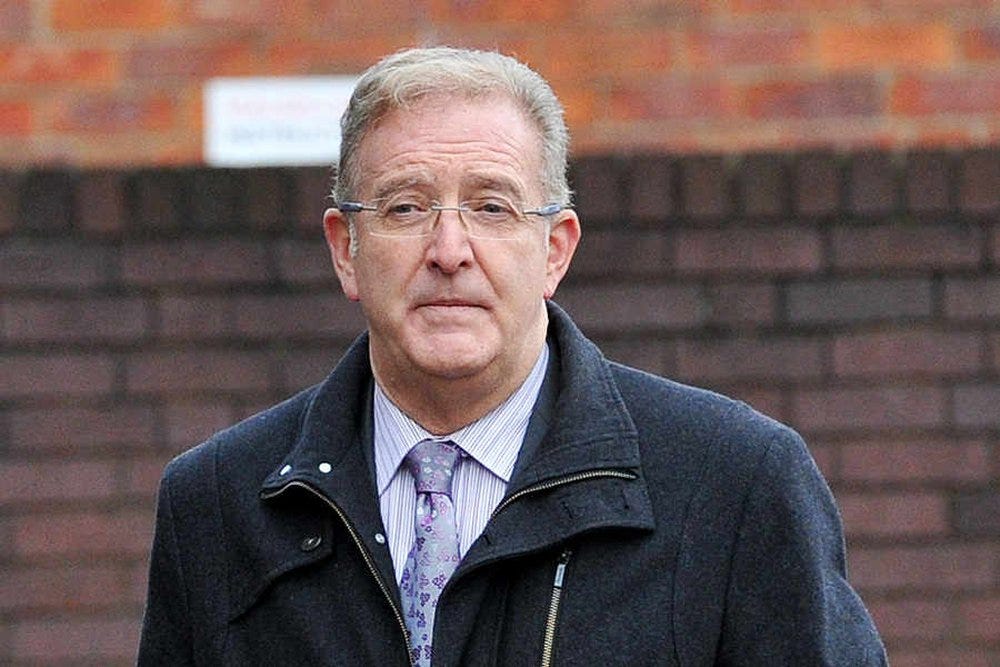 A person in a black coat
Description automatically generated A person in a black coat
Description automatically generated