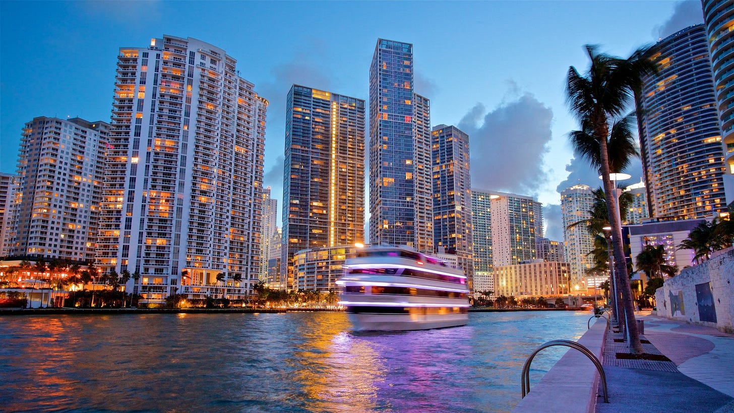 Miami showing a city, a bay or harbor and night scenes Miami showing a city, a bay or harbor and night scenes
