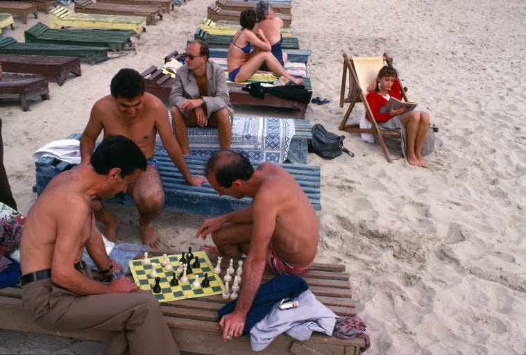 Beachgoers enjoying a game of chess in Odessa. Beachgoers enjoying a game of chess in Odessa.