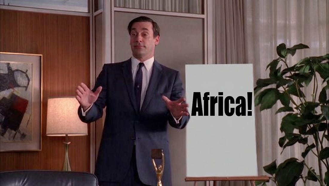 Don Draper from Mad Men gesturing toward a presentation easel with the word "Africa!" written in bold black text, used as a meme to satirize Alexandre Arnault's pitch at the LVMH 2026 Annual General Meeting positioning Africa as the next major growth market for Moët Hennessy and the Wines & Spirits division.