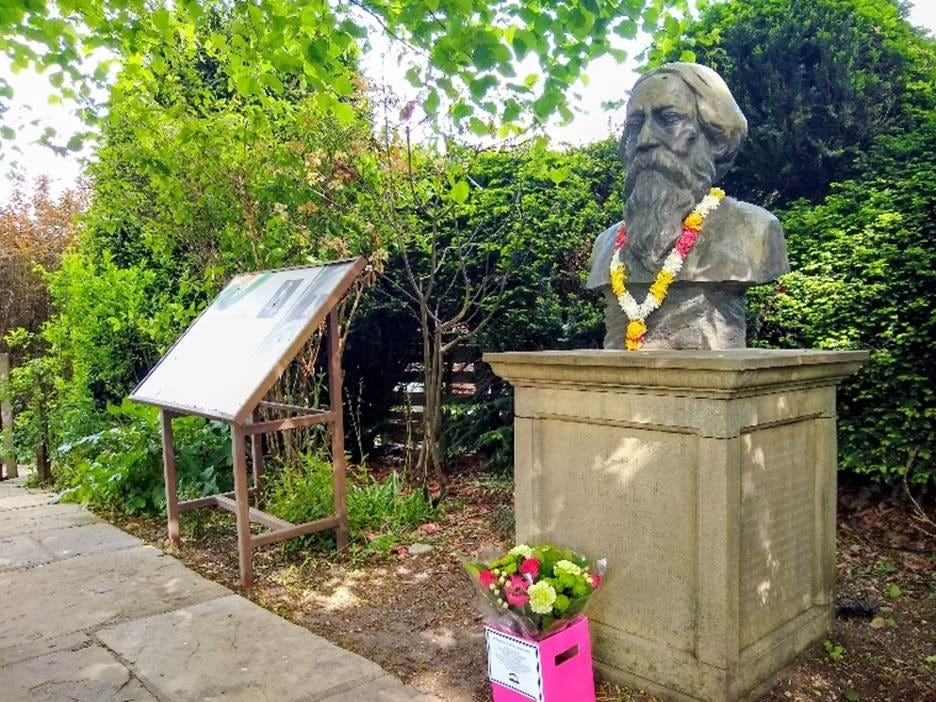 A statue of a person with a flower necklace
AI-generated content may be incorrect. A statue of a person with a flower necklace
AI-generated content may be incorrect.
