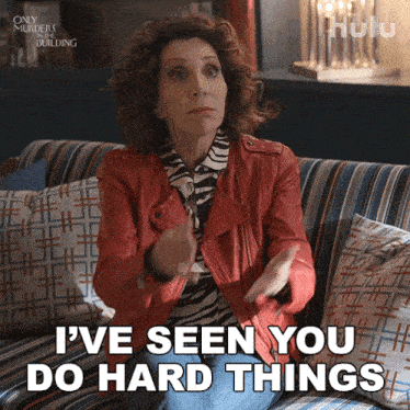 a woman sitting on a couch with the words i 've seen you do hard things