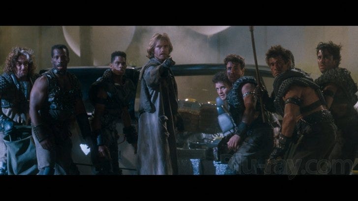 Denis Leary as resistance leader Edgar Friendly, all dirty and in need of a haircut, surrounded by his equally dirty followers