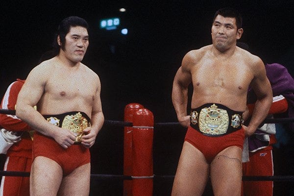 Strong Kobayashi & Seiji Sakaguchi with those beautiful NWA North American tag belts. They don't make belts this nice anymore. Strong Kobayashi & Seiji Sakaguchi with those beautiful NWA North American tag belts. They don't make belts this nice anymore.