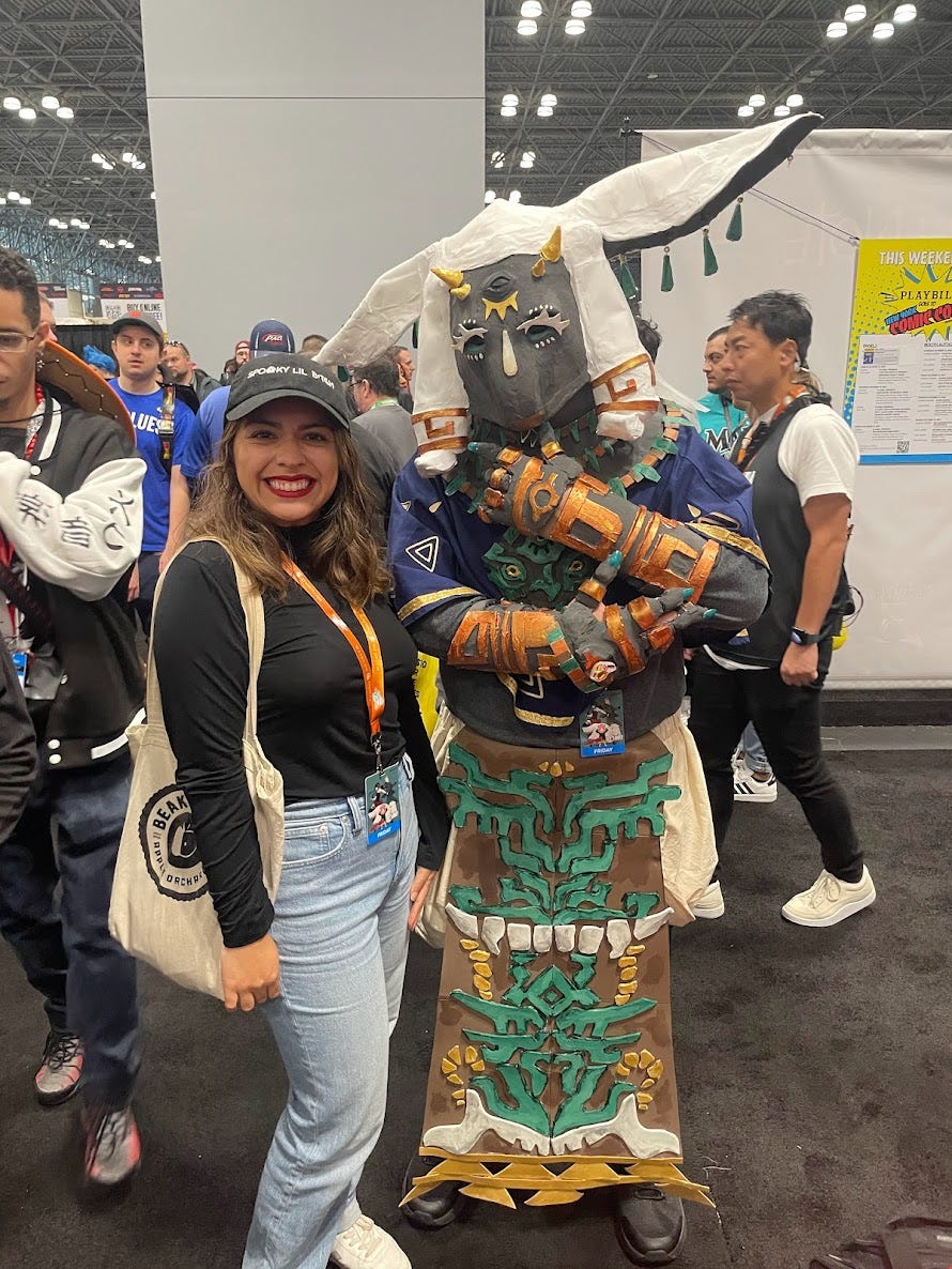 Lauren poses next to a man in homemade King Rauru cosplay