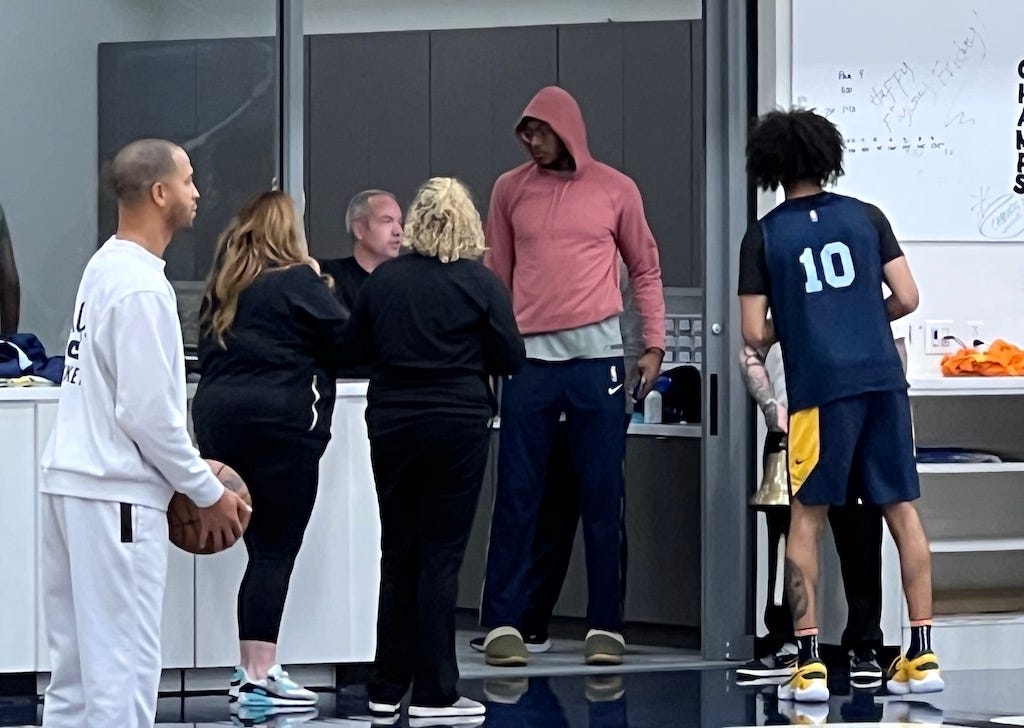 Myles Turner with head athletic trainer Josh Corbeil after practice on Thursday.