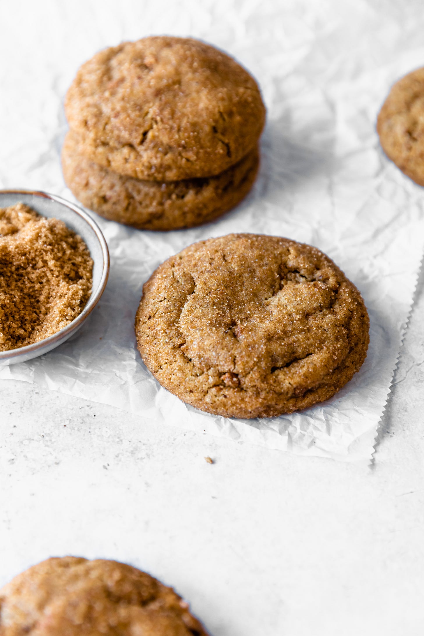 Vegan Biscoff cookies on white parchment paper Vegan Biscoff cookies on white parchment paper