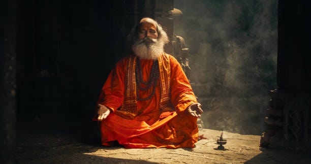 Authentic Shot of An Indian Senior Monk Practicing Yoga In A Temple Setting. Serene And Meditative Display Of Ancient Spiritual Practice, Seeking Profound Sense of Inner Peace and Enlightenment Authentic Shot of An Indian Senior Monk Practicing Yoga In A Temple Setting. Serene And Meditative Display Of Ancient Spiritual Practice, Seeking Profound Sense of Inner Peace and Enlightenment monk stock pictures, royalty-free photos & images