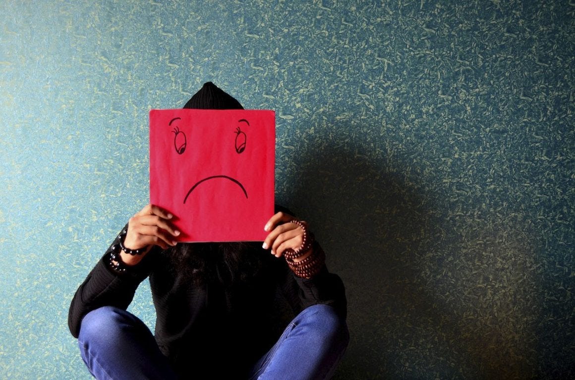 Sad face sign Sad face sign