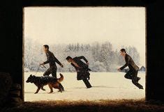 This may contain: three men are running in the snow with their dogs
