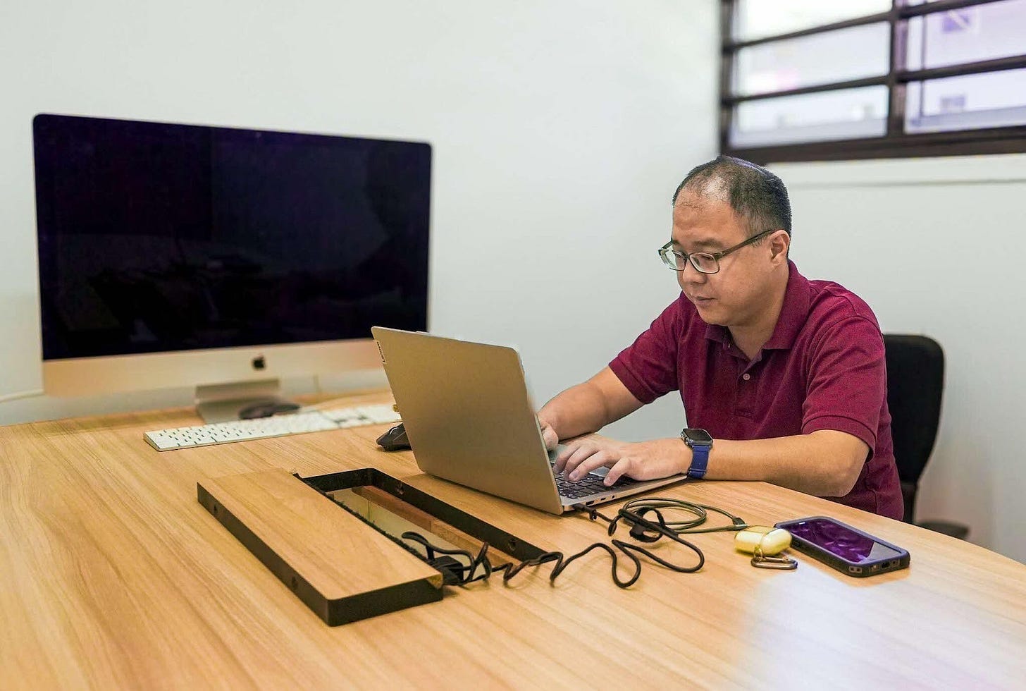 jun jie at his desk