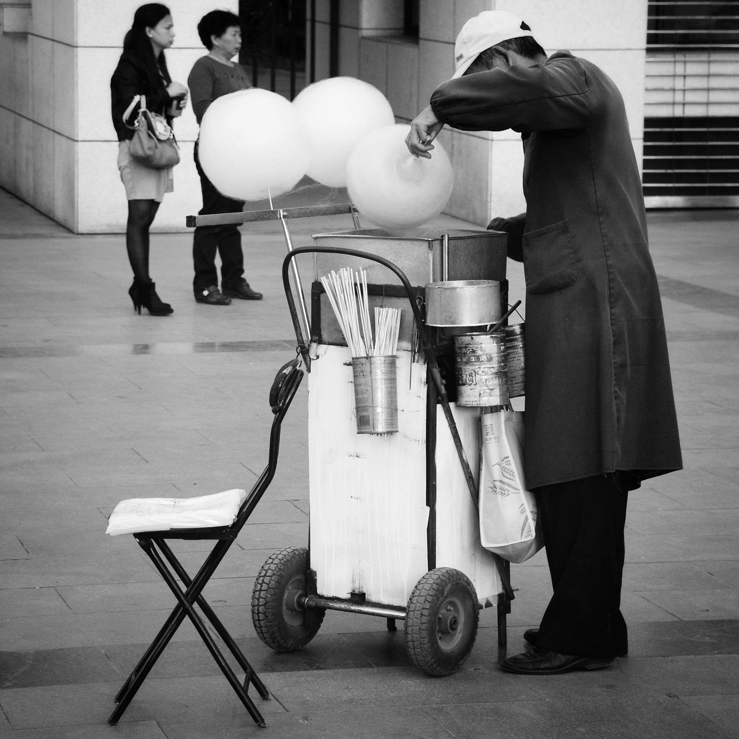 A cotton candy vendor at work on the streets of Xining, Qinghai Province.