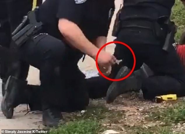 The video has gone viral and sparked an internal investigation, which has revealed that the deputy did not take anything out of his pocket, but rather passed the baggie recovered from Griffin's packet hand to hand, before pacing it on the ground