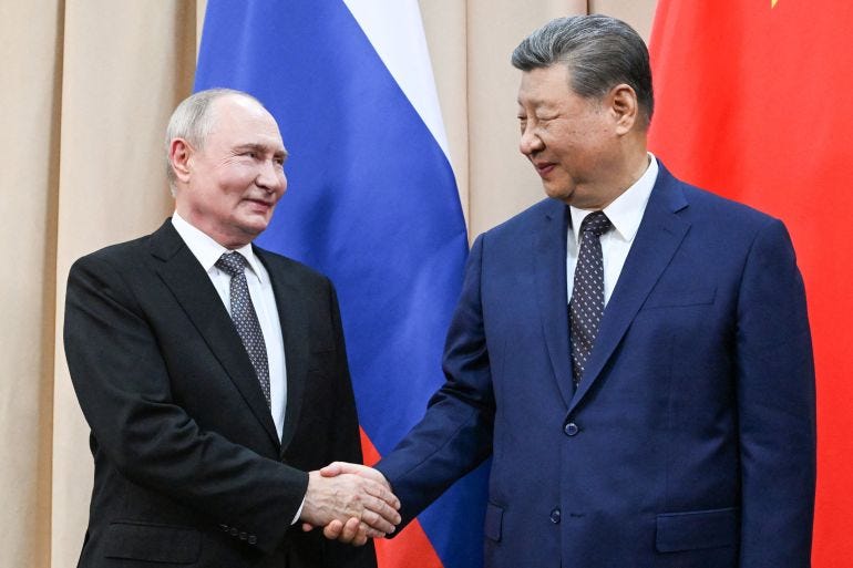 Russian President Vladimir Putin and Chinese President Xi Jinping shake hands during a meeting on the sidelines of the Shanghai Cooperation Organisation summit in Bishkek, Kyrgyzstan, on August 31, 2026. [Pool/Reuters]