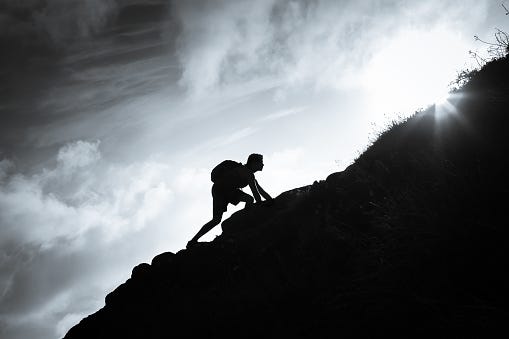 Man Climbing Up A Mountain Stock Photo - Download Image Now - Mountain,  Clambering, Climbing - iStock