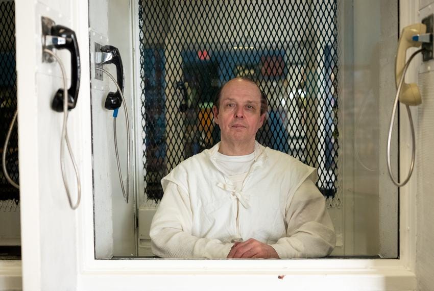 Robert Roberson photographed through plexiglass at TDCJ Polunsky Unit in Livingston on Dec. 19, 2023. Texas death row prisoners are housed in Livingston but executed at the state prison in Huntsville, about 43 miles away.