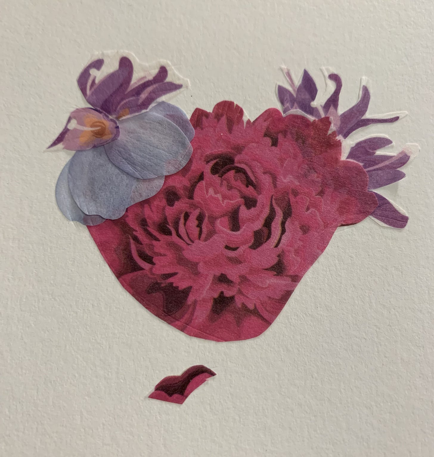 A chicken created from washi tape with a frilly pink body, a puffy blue neck and wavy purple swaths of tail and comb.