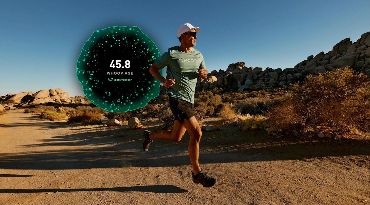 A runner wearing a WHOOP fitness tracker checks performance data on a smartphone displaying a biological age younger than their actual age. A runner wearing a WHOOP fitness tracker checks performance data on a smartphone displaying a biological age younger than their actual age.