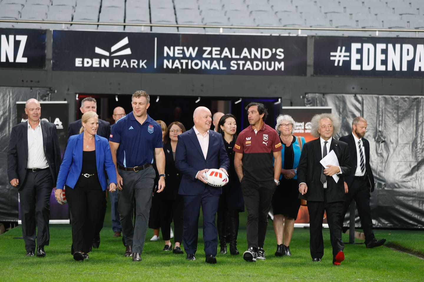 Prime Minister Christopher Luxon (centre), joined by Tourism and Hospitality Minister Louise Upston (from front left) and former NRL stars Ryan Hoffman and Johnathan Thurston at Eden Park. Photo / Michael Craig Prime Minister Christopher Luxon (centre), joined by Tourism and Hospitality Minister Louise Upston (from front left) and former NRL stars Ryan Hoffman and Johnathan Thurston at Eden Park. Photo / Michael Craig