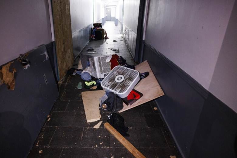 Personal items and trash in the hallway at the apartment building where ICE raided and detained migrants during a night operation at 7500 S South Shore Drive in South Shore, Wednesday, Oct. 1, 2025. | Anthony Vazquez/Sun-Times