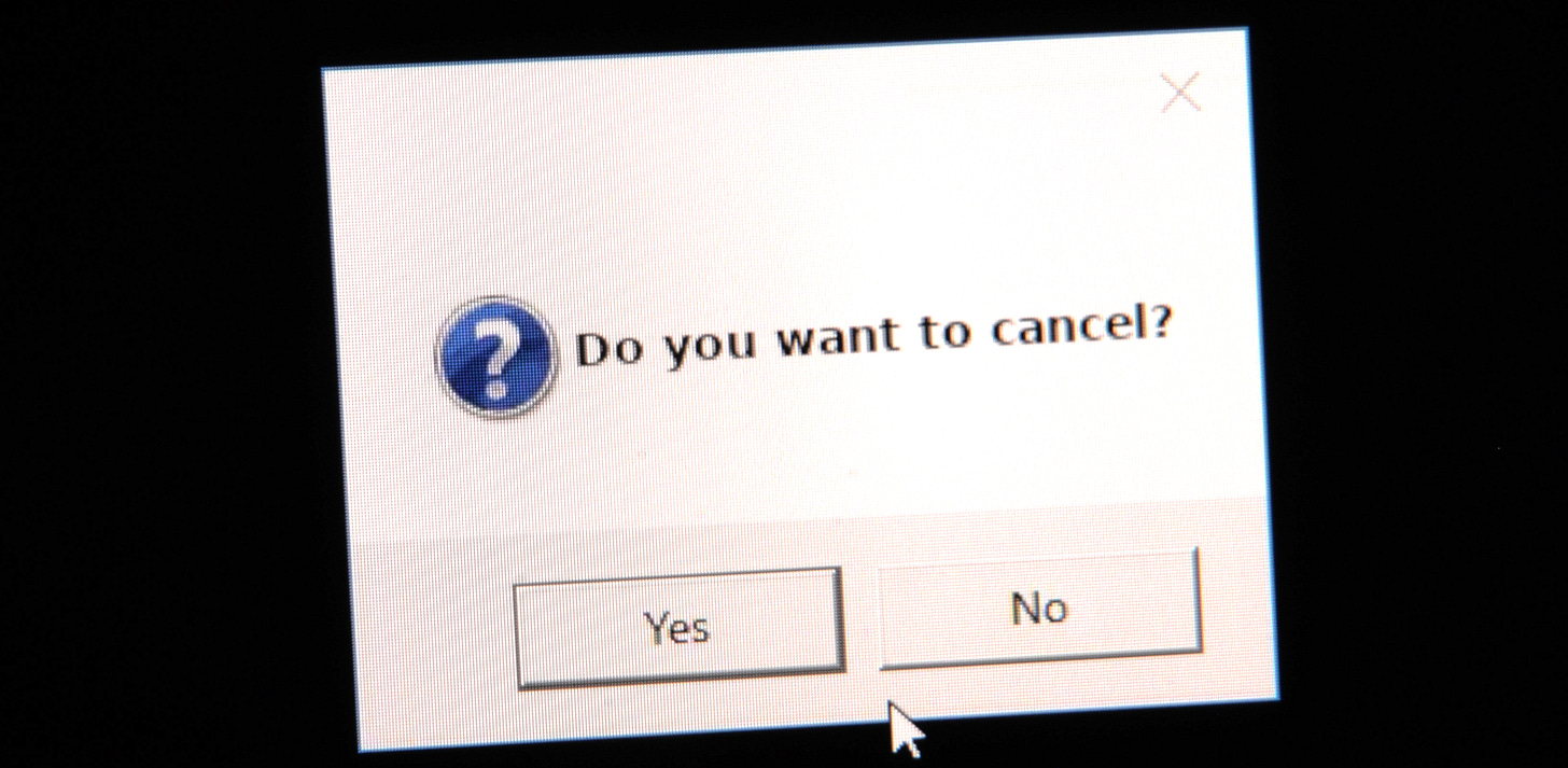 A computer pop up message asking "Do you want to cancel?" with Yes and No buttons.