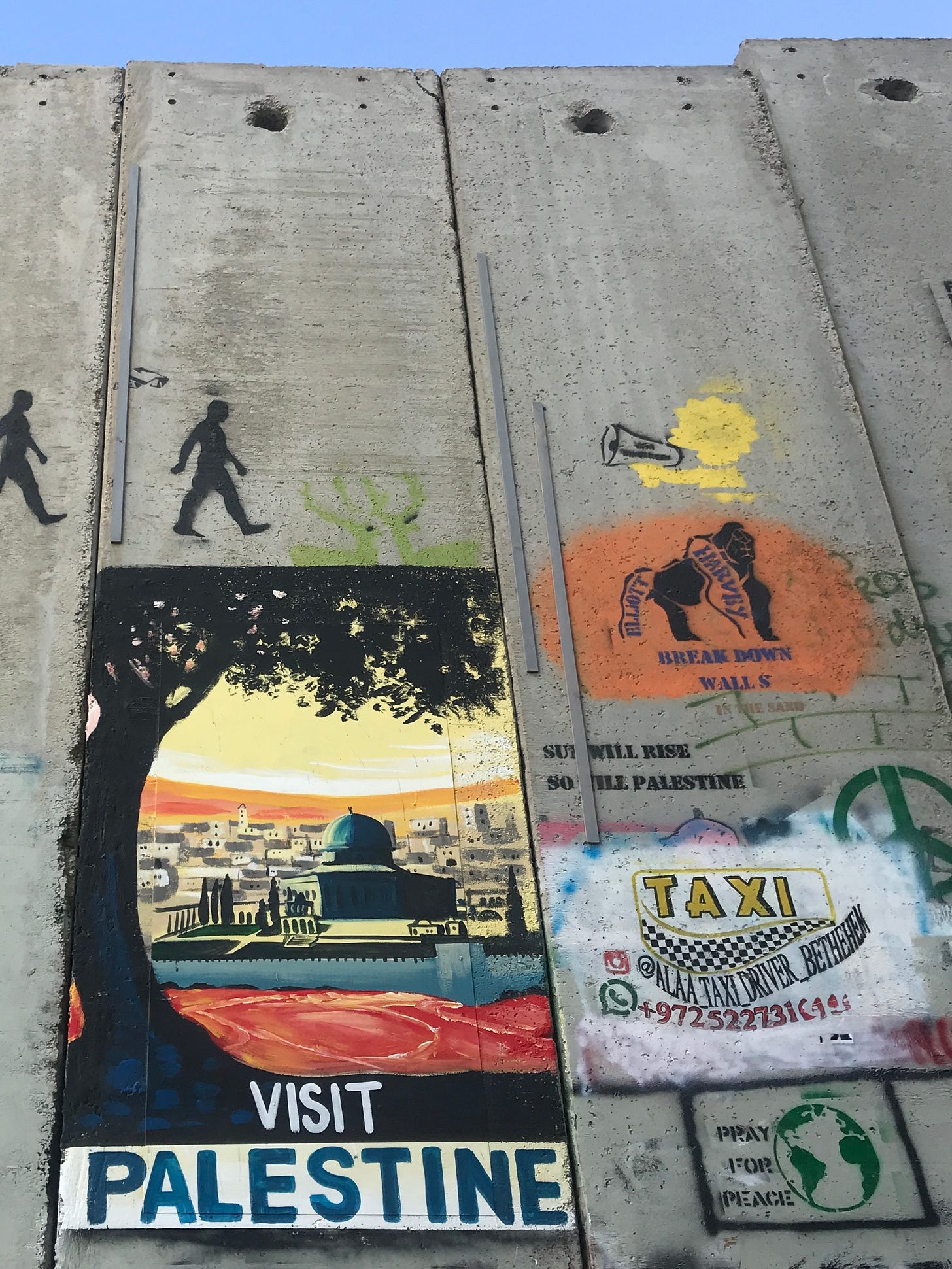Street art and stencils on the segregation wall in Bethlehem, including a painted “Visit Palestine” poster and a hand-painted taxi advertisement with phone number, showing how local taxi drivers promote their services directly on the wall amid political graffiti and messages. Street art and stencils on the segregation wall in Bethlehem, including a painted “Visit Palestine” poster and a hand-painted taxi advertisement with phone number, showing how local taxi drivers promote their services directly on the wall amid political graffiti and messages.