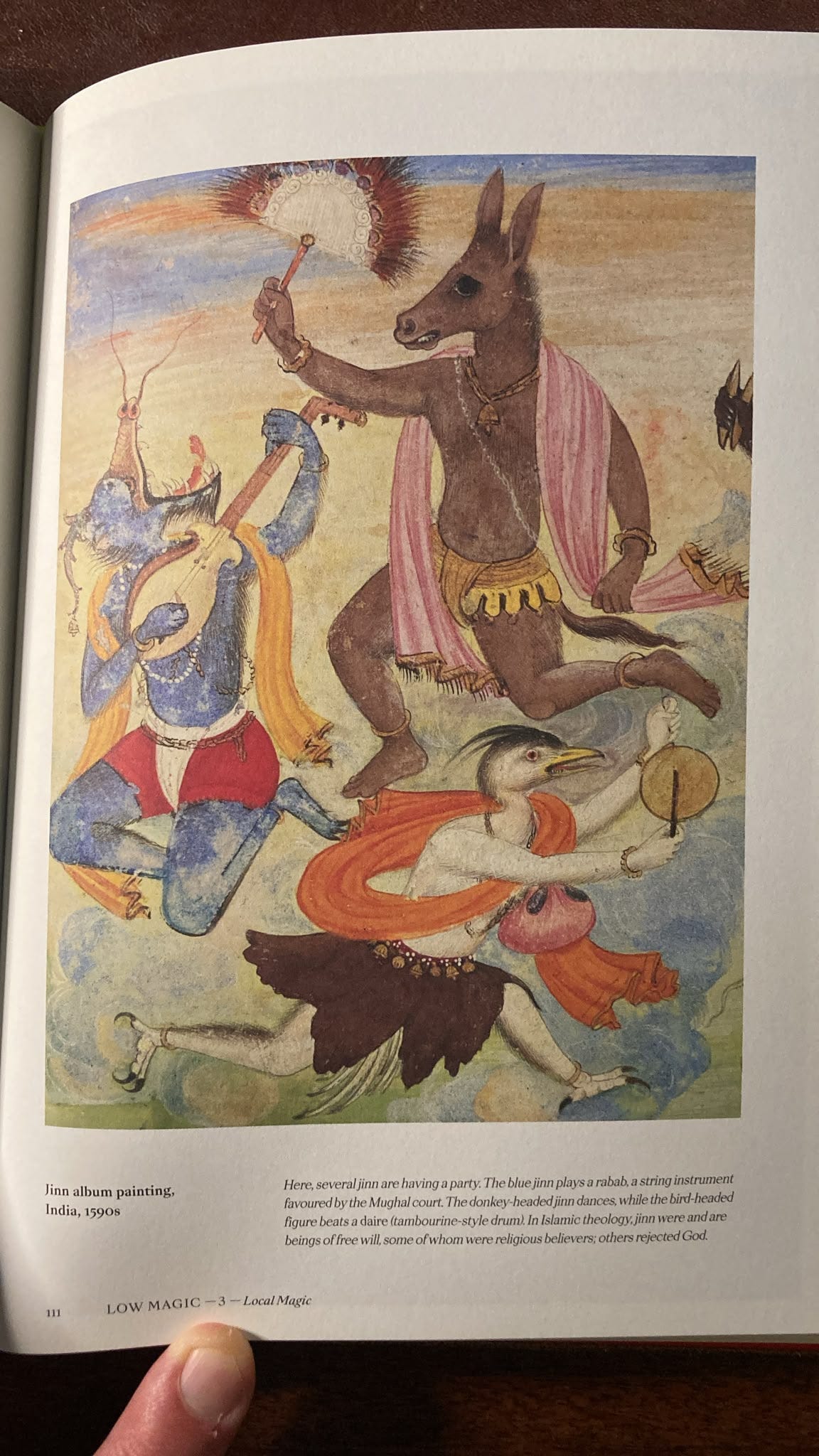 A colourful Indian album painting from the 1590s, reproduced in Magick, depicting fantastical animal-headed jinn dancing and playing musical instruments, including a rabab and a drum. A colourful Indian album painting from the 1590s, reproduced in Magick, depicting fantastical animal-headed jinn dancing and playing musical instruments, including a rabab and a drum.