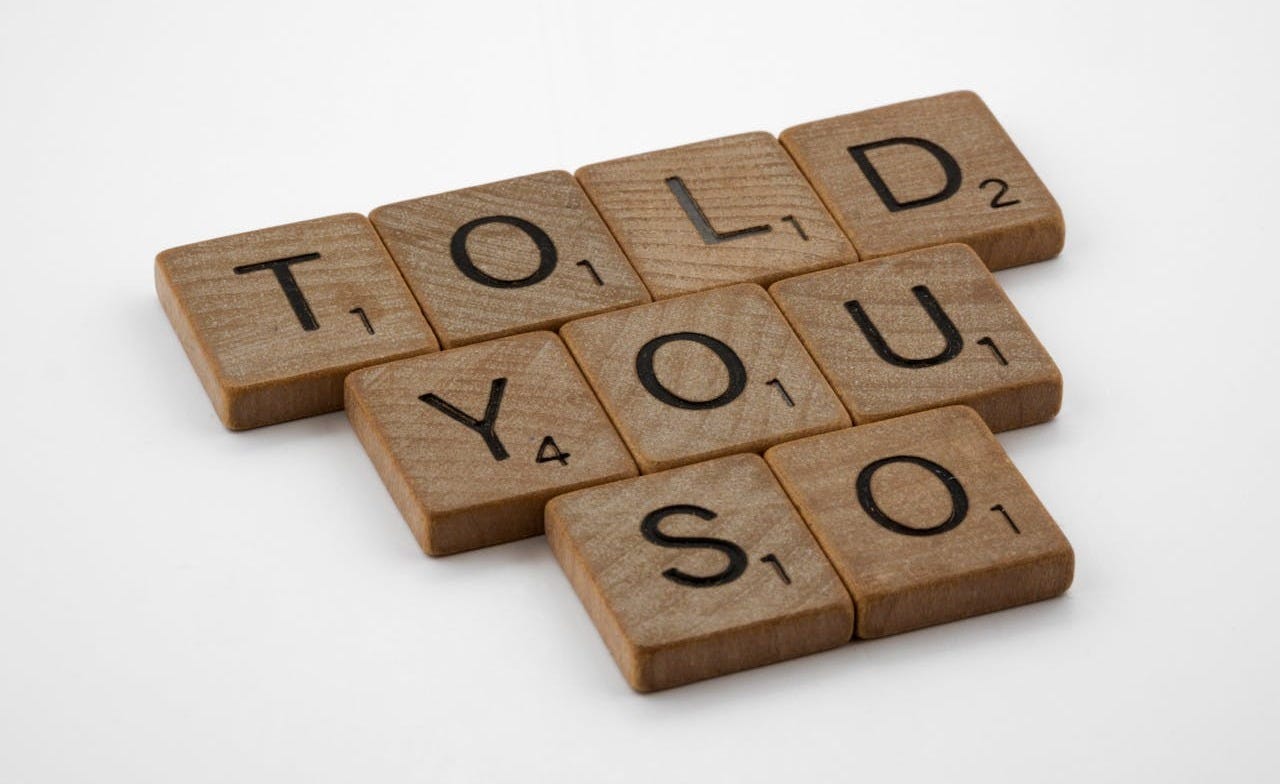 "I Told You So" Photo by Brett Jordan: https://www.pexels.com/photo/brown-wooden-scrabble-tiles-in-close-up-photography-10767937/