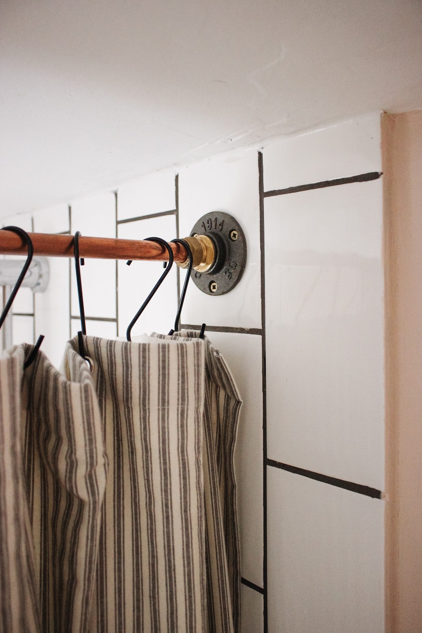 antipode.substack.com copper pipe shower curtain rail