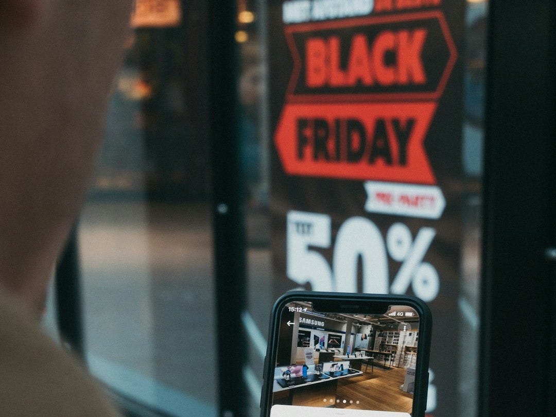 person holding black samsung android smartphone