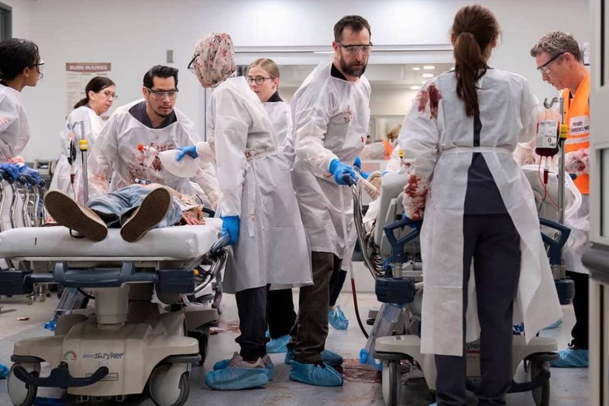 The crew of The Pitt, including Dr. Robby (Noah Wyle), attend to multiple shooting victims in "6:00 AM"