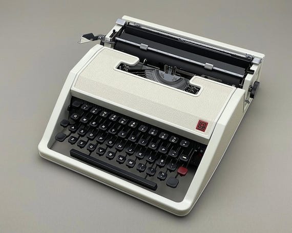 Pre-order Olivetti Lettera DL SPECIAL EDITION Working Portable Typewriter  in Excellent Condition New Faux Leather Cover New Ribbon Qwerty - Etsy  Australia