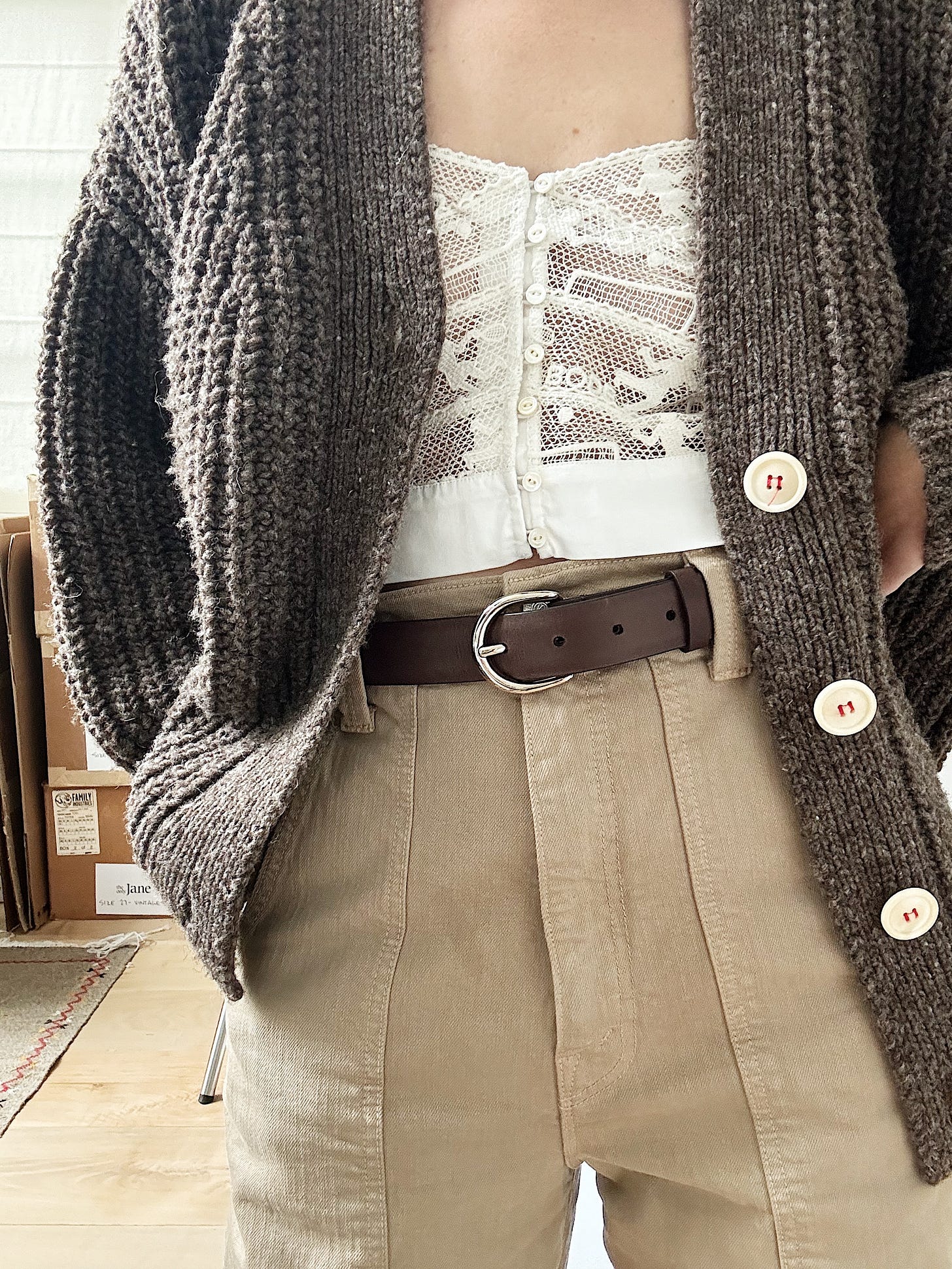 Mother cargo jeans, Bode white lace bralette, Jenni Kayne brown belt Mother cargo jeans, Bode white lace bralette, Jenni Kayne brown belt