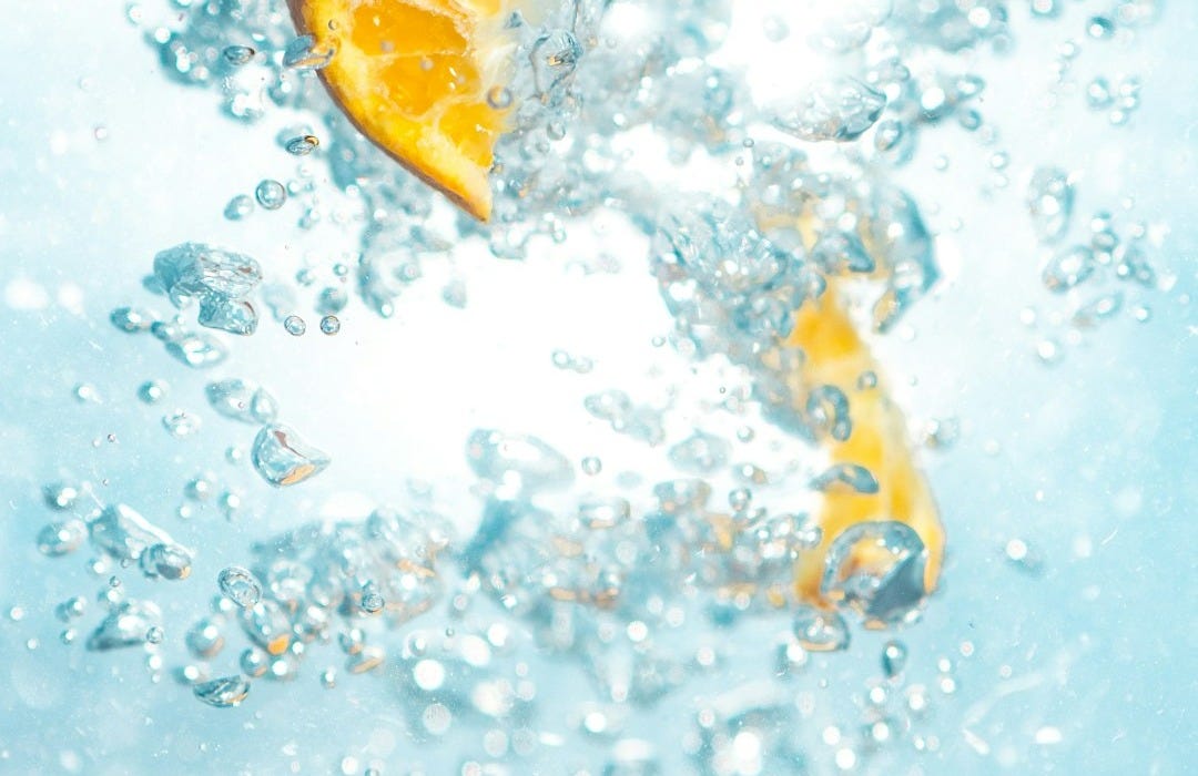 sliced orange fruits underwater sliced orange fruits underwater